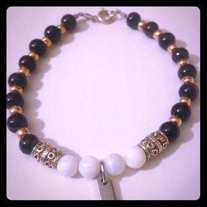 Woman's Black Bead Charm Bracelet